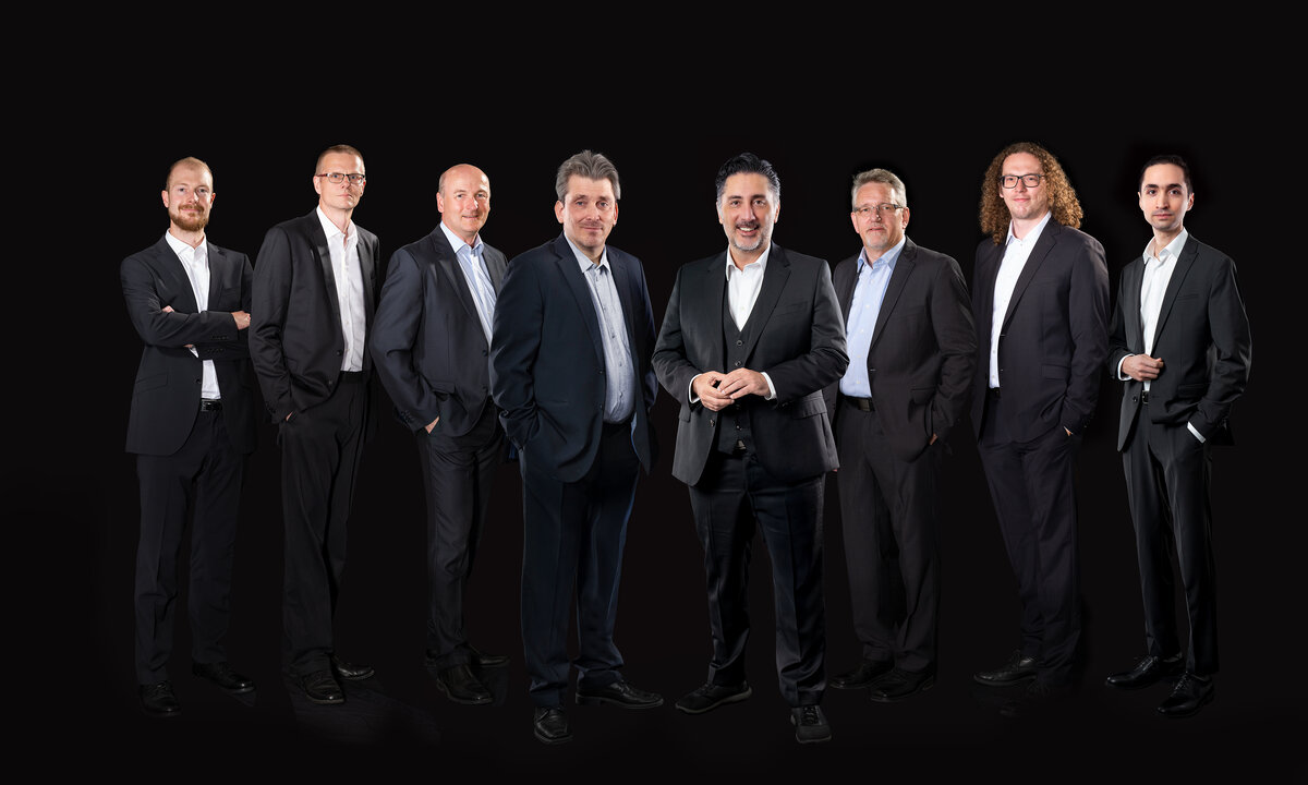 Group picture of the E+H Metrology management team: Jonas Antes, Juergen Lang, Peter Michel, Dr. Michael Jörger, Daniel Raseghi, Heiko Rings, Sebastian Koenigsmann, Navid Razeghi